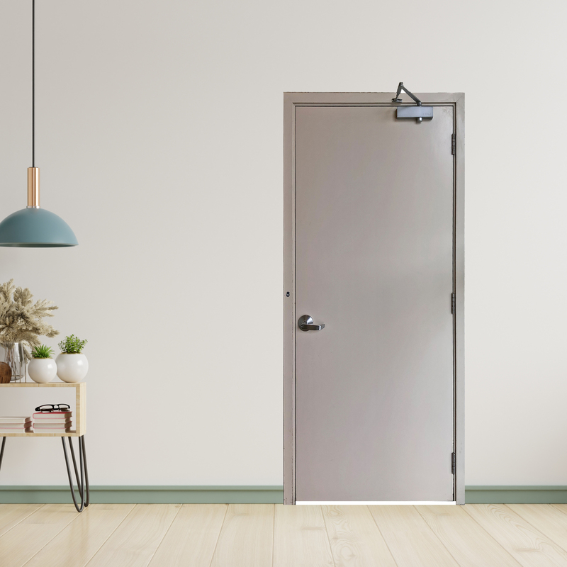 Cửa thép chống cháy TCC P1 xám trằng dùng cùi chỏ hơi thuỷ lực